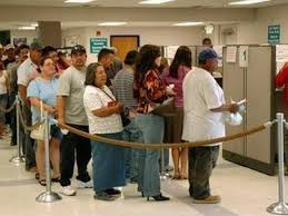 ... Americans waiting in line for government handouts